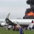 Em directo: Passageiros em pânico a evacuarem avião em chamas no aeroporto